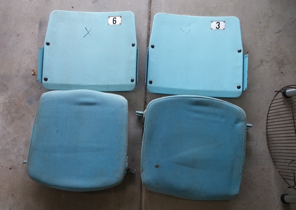 As is. Two seats from the Dean Dome as they came - backs and seats only. Nothing else (except 30 plus years of grime). 